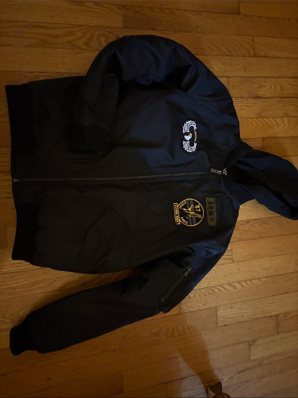 U.S. Army Black Bomber Jacket with Gold Patch Accents
